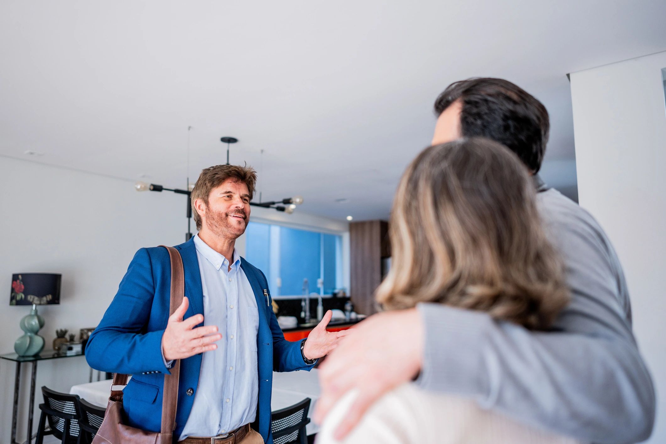 Agent showing a property to clients